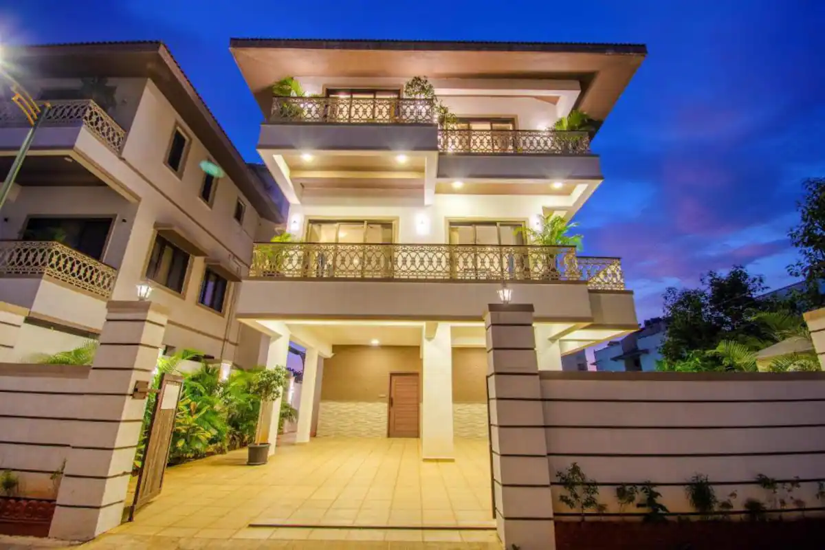 Margarita Villa exterior lit at twilight