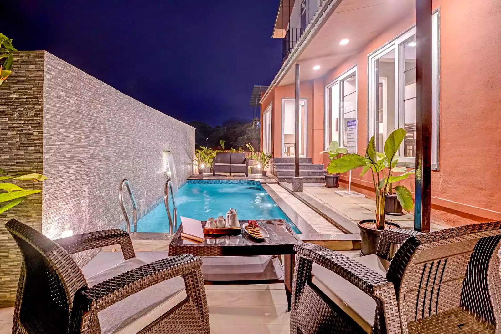 Outdoor lounge seating by the pool